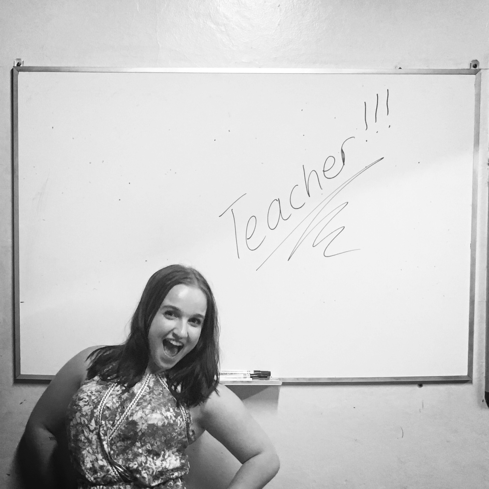 Johanna in front of a whiteboard